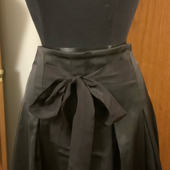 Midi-length Black Satin Skirt with Front Bow Detail - Picture 2 of 4